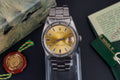 Rolex Oyster Perpetual Date 1501 – Vintage Champagne Dial – Engine-Turned Bezel – Full Set